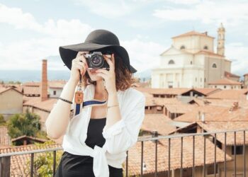 Travel girl with a camera