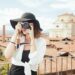 Travel girl with a camera